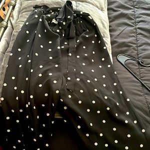 Black and White polka dot pants. Stretch top with bow